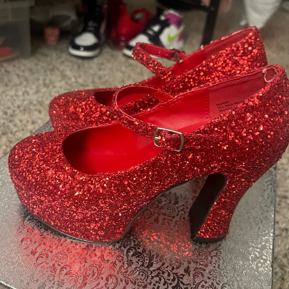 Red sparkly platform heels